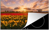 KitchenYeah® Inductie beschermer 83x51.5 cm - Geel veld tulpen - Kookplaataccessoires - Afdekplaat voor kookplaat - Inductiebeschermer - Inductiemat - Inductieplaat mat