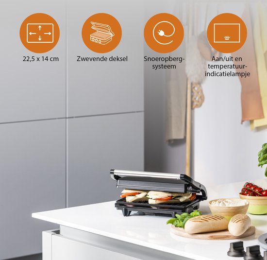 Zwarte Tristar contactgrill met broodjes, groenten en aanduidingen van afmetingen, snoeropbergsysteem en indicatielampje.