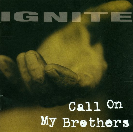 Albumhoes met de tekst IGNITE en Call On My Brothers op een wazige afbeelding van een hand.