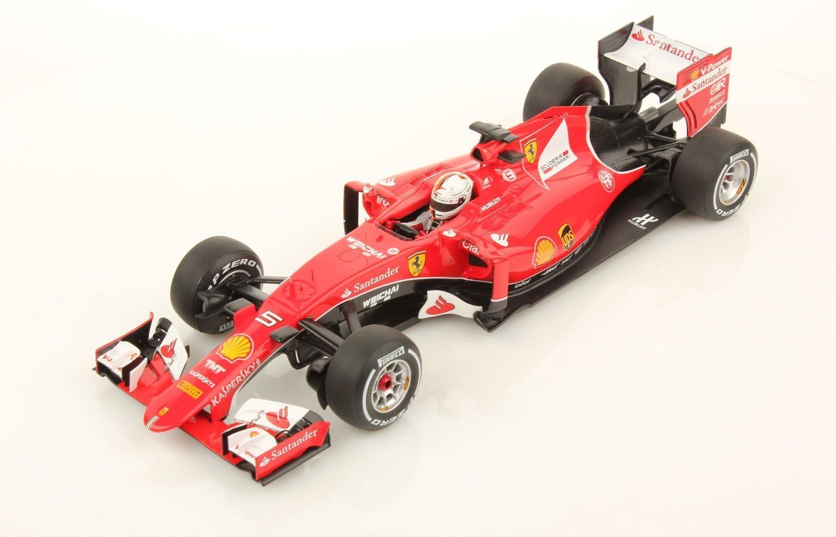 De 1:18 Diecast modelauto van de Ferrari SF15-T #5 die de GP van Maleisië won in 2015.De coureur is Sebastien Vettel.De fabrikant van dit schaalmodel is Looksmart.