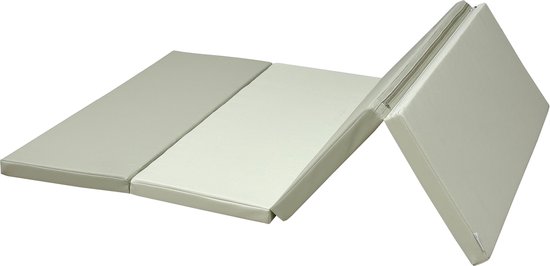 Speelmat deels uitgevouwen, met beige en grijze panelen.