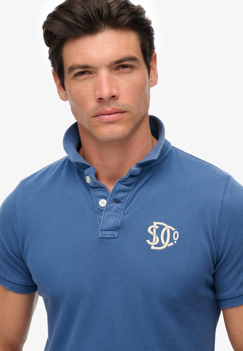 Superdry Vintage Athletic Korte Mouw Poloshirt L Man Blauw