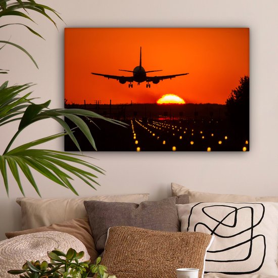 Canvas schilderij 90x60 cm - Wanddecoratie Zonsondergang - Vliegtuig - Oranje - Zon - Muurdecoratie woonkamer - Slaapkamer decoratie - Kamer accessoires - Schilderijen op canvas