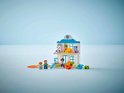 LEGO Duplo dokterscentrum met 3 poppetjes, waaronder een dokter, en een surfplank.