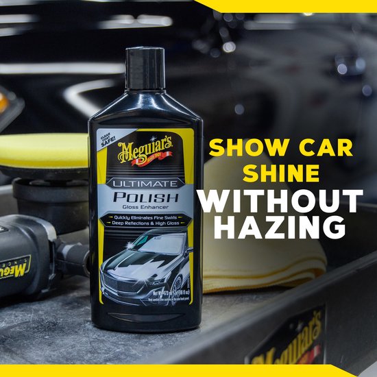 Fles Meguiar's Ultimate Polish naast een polijstmachine en doeken. Tekst: SHOW CAR SHINE WITHOUT HAZING.