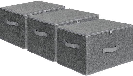 Drie grijze opbergboxen naast elkaar.