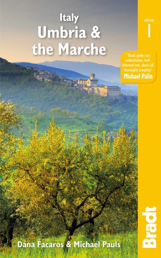 Boek 'Italy Umbria & the Marche' met een stadsgezicht op een heuveltop op de achtergrond en olijfbomen op de voorgrond. Bradt.