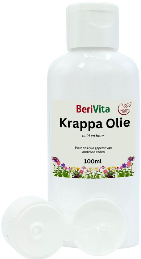 Witte fles Berivita Krappa Olie 100ml, met een label met bloemen, "Puur en koud geperst van Andiroba zaden".