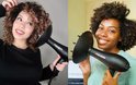 Twee vrouwen met krullend haar die een zwarte Curlsmith haardroger gebruiken.