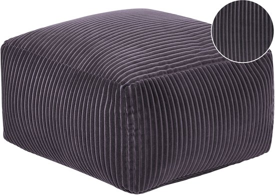 Pouf gris foncé en velours côtelé avec côtes verticales.