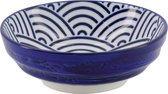 Wit schaaltje met blauwe golfdecoratie, effen blauwe buitenzijde.