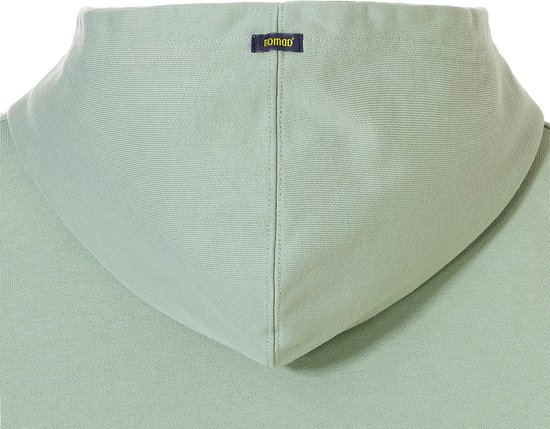 Close-up van de mintgroene capuchon met een klein NOMAD label.