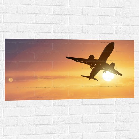 Muursticker - Silhouet van Passagiersvliegtuig Vliegend langs de Zon - 100x50 cm Foto op Muursticker