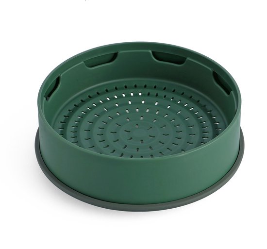 Groen GreenPan stoommandje met perforaties.