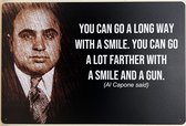 Al Capone you can long way with a smile Reclamebord van metaal METALEN-WANDBORD - MUURPLAAT - VINTAGE - RETRO - HORECA- BORD-WANDDECORATIE -TEKSTBORD - DECORATIEBORD - RECLAMEPLAAT - WANDPLAAT - NOSTALGIE -CAFE- BAR -MANCAVE- KROEG- MAN CAVE