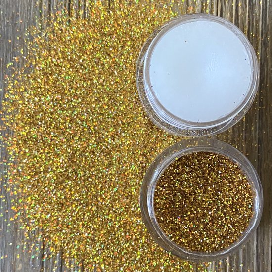 Foto: Getglitterbaby gouden fijne poeder biologische biologisch milieuvriendelijke afbreekbare festival glitters voor lichaam en gezicht jewels vegan bio biodegradable face body glitter glue goud huid lijm