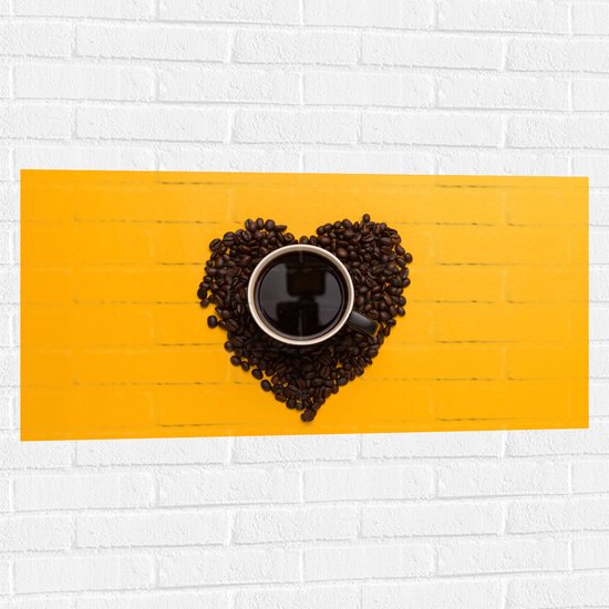 Muursticker - Kop Koffie in Hart Koffiebonen op Okergele Achtergrond - 100x50 cm Foto op Muursticker