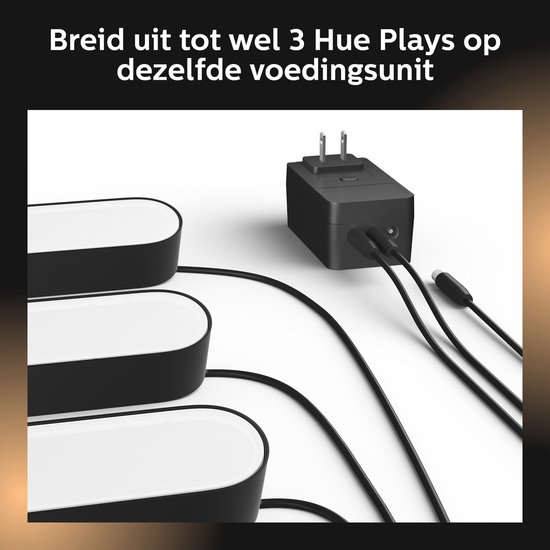 Trois barres lumineuses Philips Hue Play connectées à un seul adaptateur secteur.