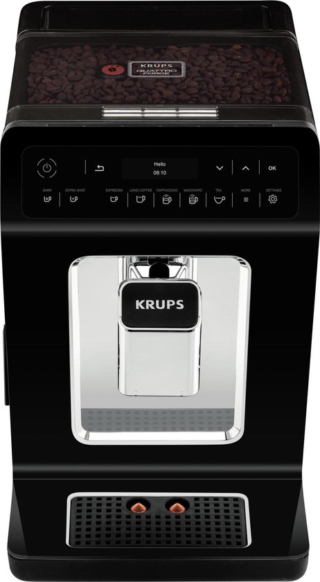 Zwarte Krups volautomatische espressomachine met digitale display en volle bonen in de tank.