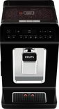 Zwarte Krups volautomatische espressomachine met digitale display en volle bonen in de tank.