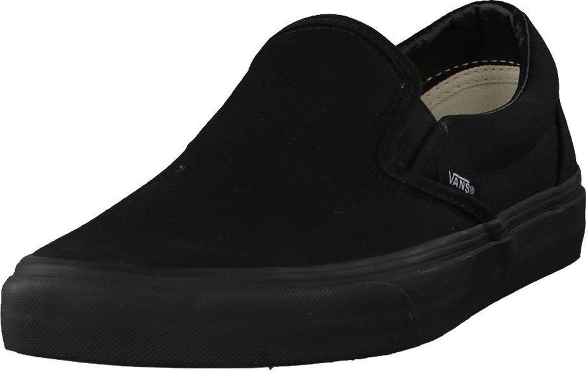 black slip on sneakers vans