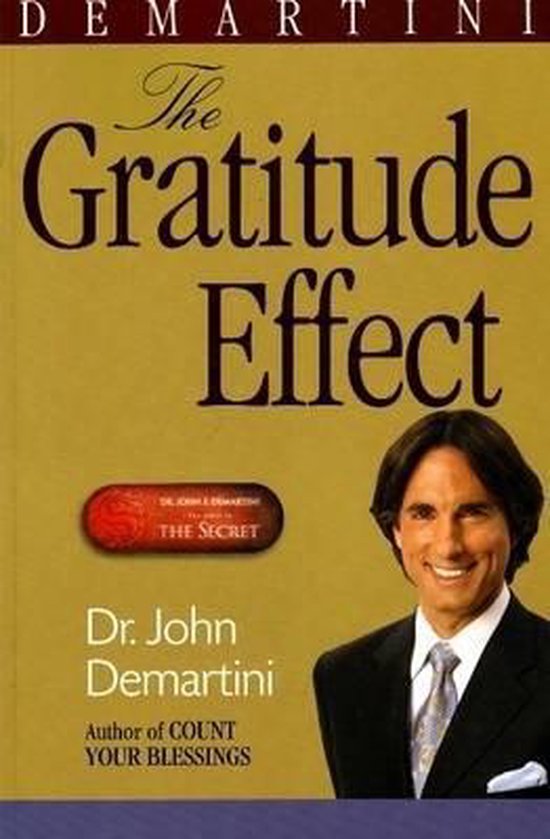 Boek "The Gratitude Effect" van Dr. John Demartini met een foto van hemzelf.