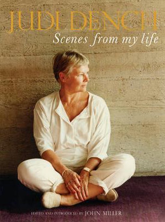 Judi Dench, Scenes from my Life. Zittend in een witte blouse en broek, met de armen over de knieën.
