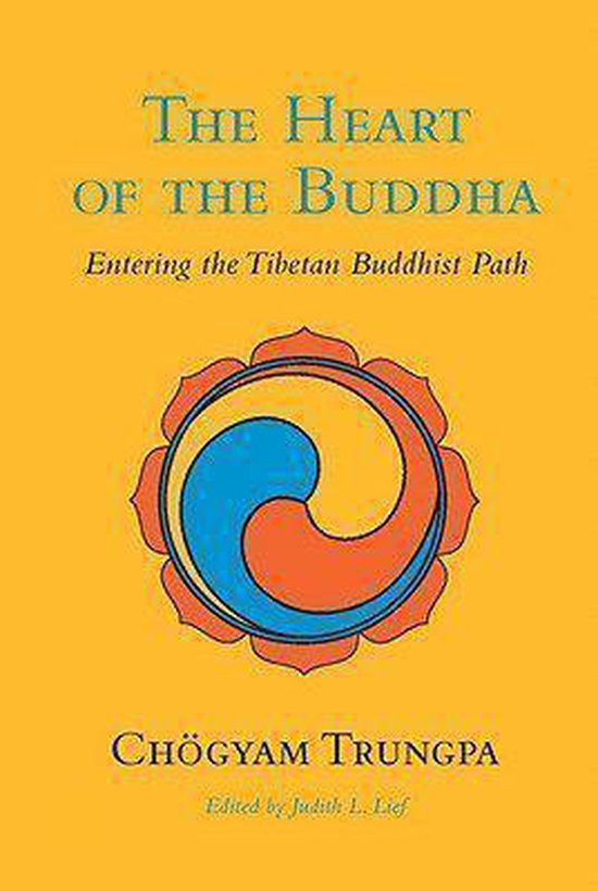 Boek "The Heart of the Buddha" met Tibetaans symbool en tekst in geel.