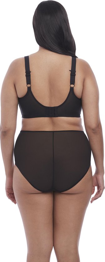 Achterkant van een model in een zwarte plunge bh en een hoge slip met doorschijnende achterkant.