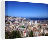 Canvas schilderij 150x100 cm - Wanddecoratie Blauwe lucht boven de Algerijnse stad Algiers - Muurdecoratie woonkamer - Slaapkamer decoratie - Kamer accessoires - Schilderijen