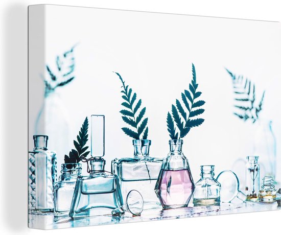 Canvas Schilderij Een verzameling van parfum op een rij - 60x40 cm - Wanddecoratie