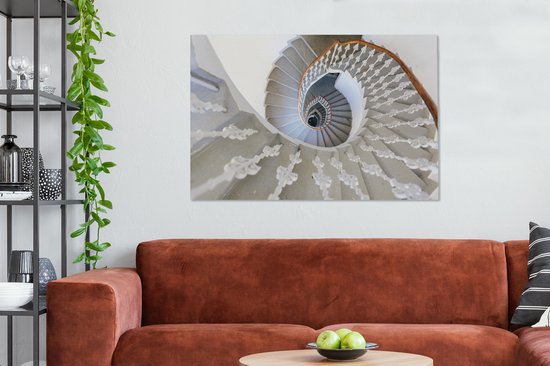 Un escalier en colimaçon vu d'en haut toile 140x90 cm - Tirage photo sur toile (Décoration murale salon / chambre)