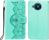 Voor Nokia 8.3 5G Flower Vine Embossing Pattern Horizontale Flip Leather Case met Card Slot & Holder & Wallet & Lanyard (Green)