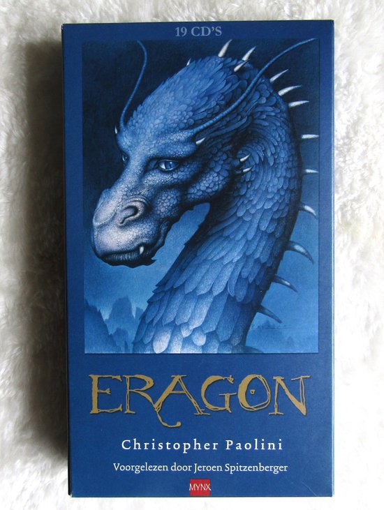 Boîte de CD d'Eragon avec un dragon bleu sur le devant. "ERAGON" en lettres dorées.