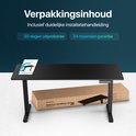 Zwart zit-sta bureau, met verpakkingsdoos en installatiehandleiding. "Verpakkingsinhoud".