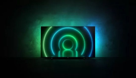 Philips tv met Ambilight, met cirkels van groen en blauw licht op de achtergrond.