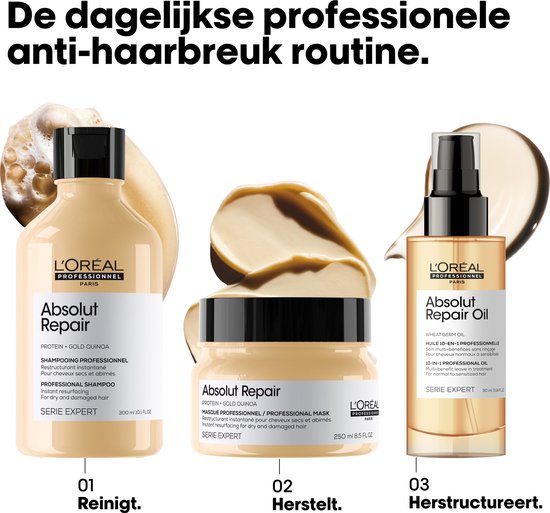 Produits L'Oréal Professionnel Absolut Repair : shampoing, masque et huile. Les produits sont de couleur beige et dorée.