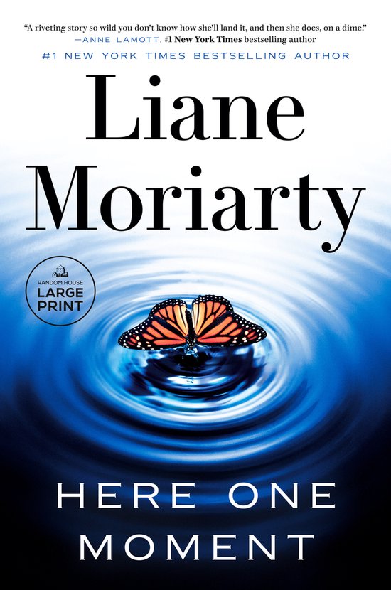 Boekomslag met de titel 'Here One Moment' van Liane Moriarty, met een vlinder op een wateroppervlak. '1 NEW YORK TIMES BESTSELLING AUTHOR'.