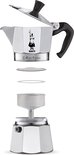 Zilverkleurige Bialetti Moka Express percolator uit elkaar gehaald, met de losse onderdelen.