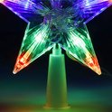 Gedetailleerde close-up van de sterkerstboom piek met multicolor LED-verlichting.