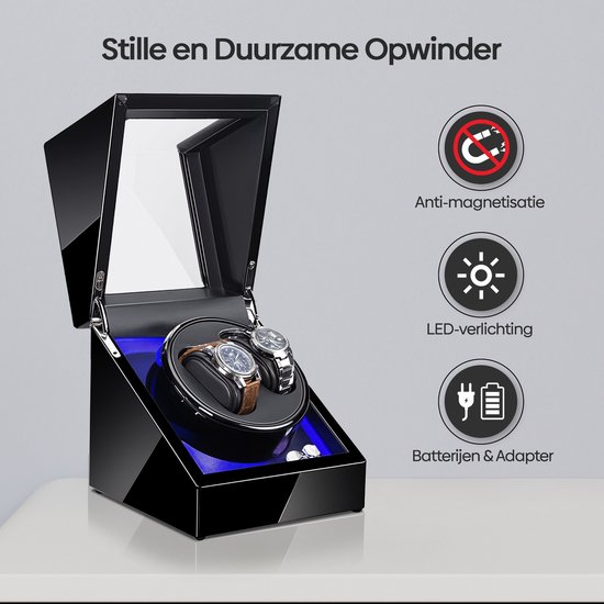 Zwarte opwinder met spiegel en blauwe LED-verlichting, toont twee horloges. Iconen voor anti-magnetisatie, LED en batterij/adapter.