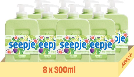 Acht lichtgroene flacons handzeep met pompdispenser in een kartonnen verpakking met de tekst '8 x 300ml'. De flacons hebben een afbeelding van vijgen en bladeren en de tekst 'Frisse Vijg Zeep zonder troep'.