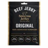 Zwarte verpakking met 'Beef Jerky Smyrna Jerky Original', 100% gedroogd rundvlees en voedingswaarden.