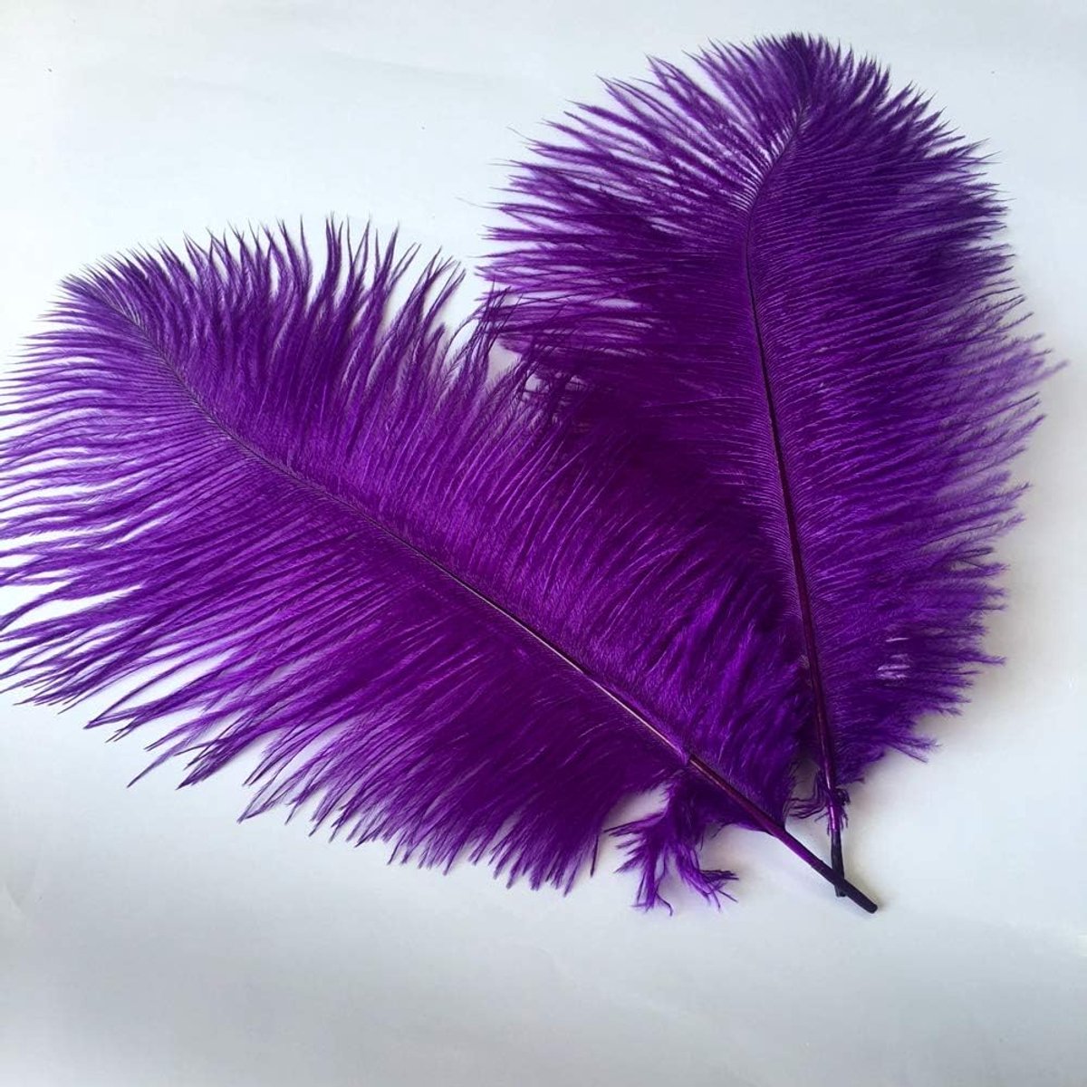 Struisvogelveer van 35 - 40 cm voor centerpiece huwelijksdiner, woondecoratie. Set van 10 stuks (paars)