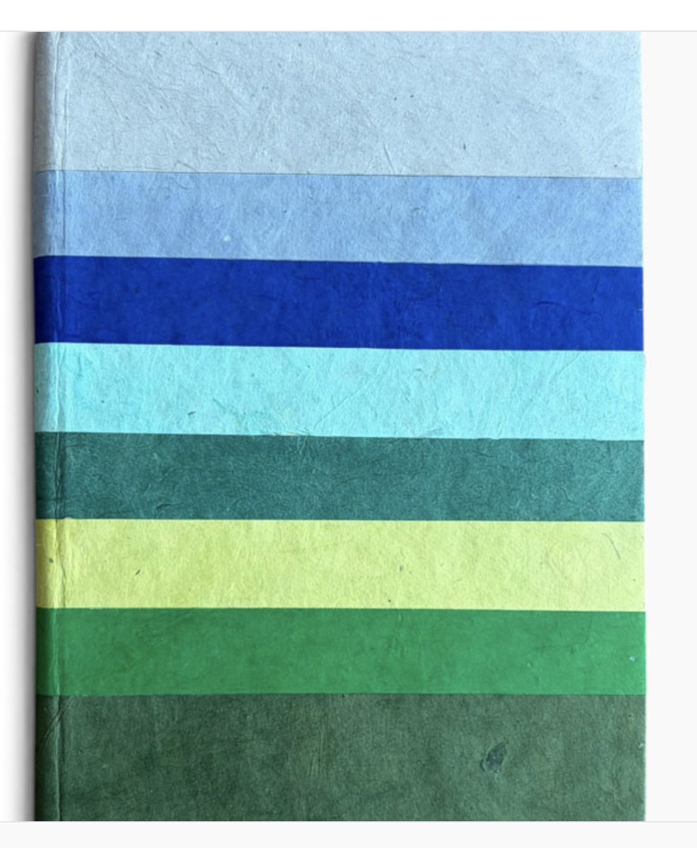 A6 notitieboek met regenboog kaft en 120 ivoorkleurige pagina's