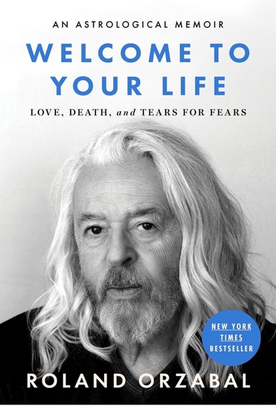 Boekcover met een zwart-witfoto van Roland Orzabal met lang grijs haar en een baard. Tekst: 'AN ASTROLOGICAL MEMOIR WELCOME TO YOUR LIFE LOVE, DEATH, and TEARS FOR FEARS NEW YORK TIMES BESTSELLER ROLAND ORZABAL'.