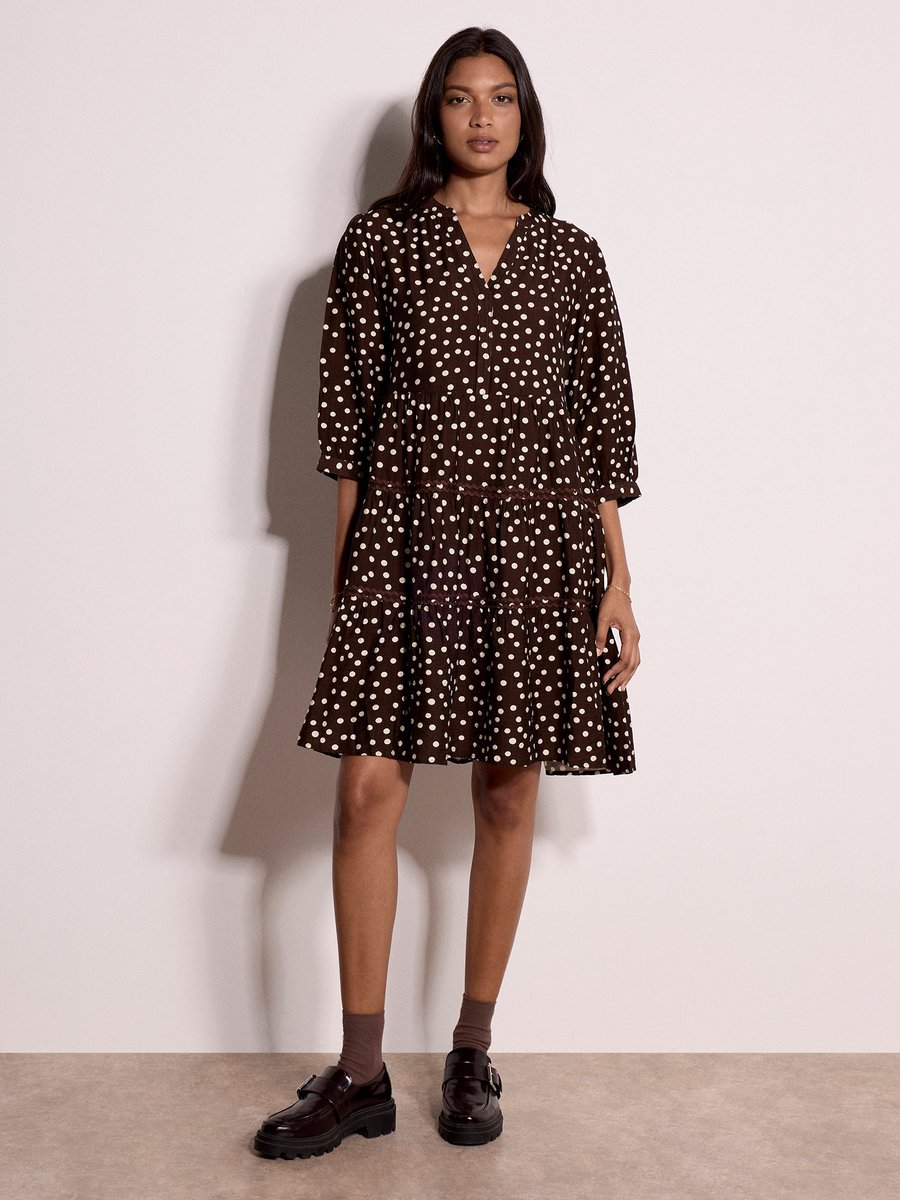Mini-jurk met polkadots en gelaagde rok