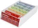 Boîte à pilules colorée avec division par jour. Tiroir rouge pour le lundi avec 5 compartiments.