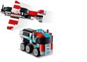 LEGO Creator 3in1 bouwpakket: een rood en zwart vliegtuig met witte strepen en een blauw, zwart en rood vrachtwagentje.