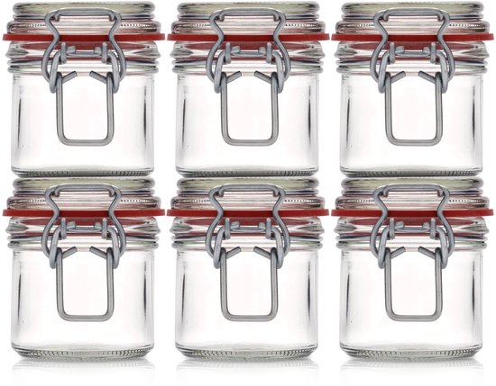 Six bocaux Le Pratique côte à côte, avec des joints rouges et des fermoirs argentés.